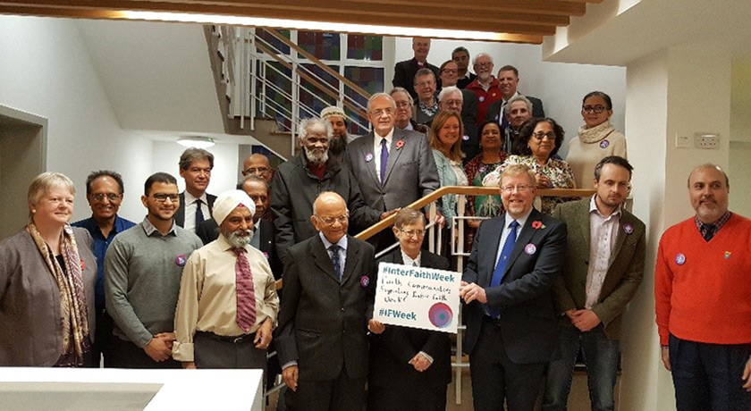 Interfaith group on stairs