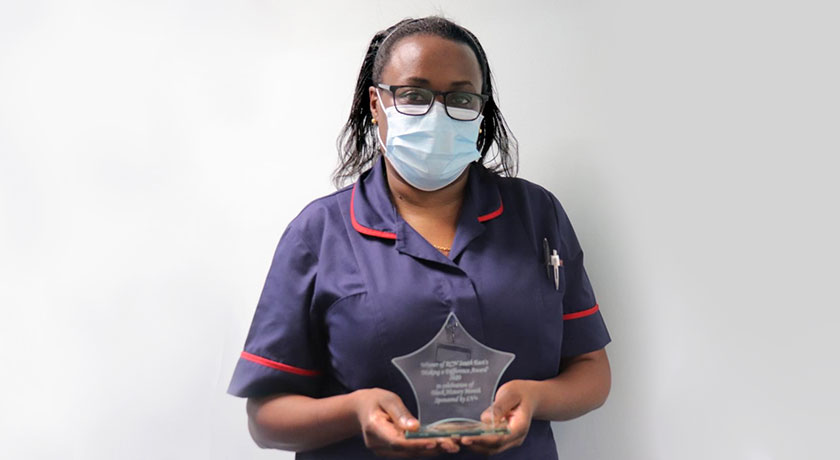 Bernice with award news banner