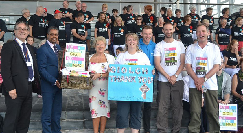 Phil and Bethan and crowd news banner